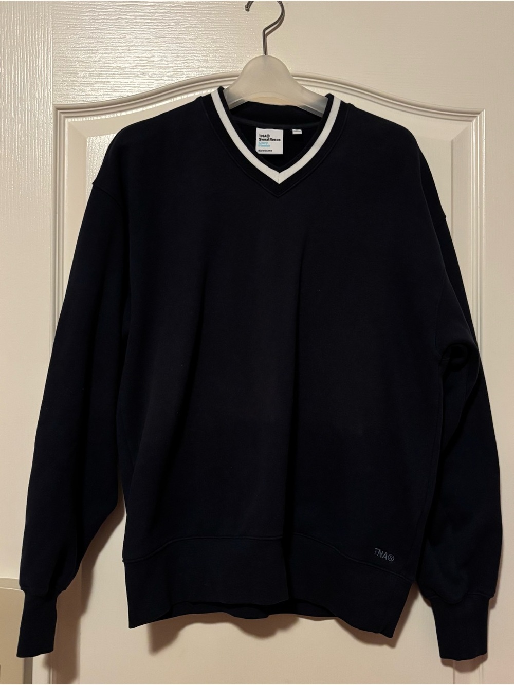 Aritzia TNA Navy V-Neck Sweater with White Trim